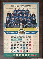 Full view of October 1964 calendar page featuring Toronto Maple Leafs team photo and Stanley Cup winners, with NHL schedule and Export brand advertising.