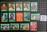 Front side of selected hockey cards featuring player portraits and action images including Dave Schultz, Ed Giacomin, Rod Gilbert, Eddie Shack, Terry O'Reilly, and Guy Lafleur.