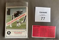 Photo of unopened plastic sleeve containing 1982 Ottawa Rough Riders Jogo football cards, showing front card of Rick Sowieta linebacker and checklist of players with card numbers
