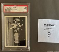 Front of the 1986 Topps Pete Rose Expos baseball card #8 graded MINT 9 by PSA with protective slab and grading label visible.