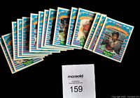 Full spread of 15 baseball cards from 1991 Kellogg's Corn Flakes Sportflics series fanned out showing images of various players on front.