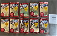 Ten unopened 1991 Soccer Shots wax packs laid out in two rows, showing original foil packaging including references to a special Pelé card inside.