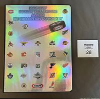 Holographic Kraft Hockey Collectors Album for 1996-97 showing NHL team logos on cover.