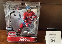 Front view of sealed 2011 P.K. Subban McFarlane NHL Debut figurine in red Canadiens jersey and blue helmet.