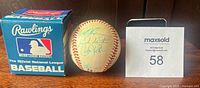 Rawlings National League baseball in original Rawlings box with auction lot number tag 58 nearby.