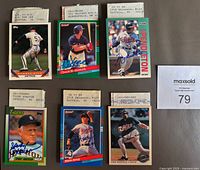 Six signed baseball cards with MLS team return envelopes placed behind each card. Cards show signatures in blue ink.