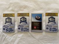 Four official 1998-99 Toronto Maple Leafs pocket schedules side by side, showing front covers.