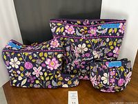 Front view of all four matching Vera Bradley bags