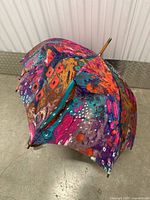 Colorful abstract pattern on the umbrella fabric exterior.