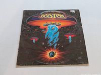 Front cover of the Boston self titled vinyl LP featuring the spaceship guitar artwork.