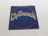 Front cover of Chilliwack Dreams Dreams Dreams vinyl LP showing title text and visible wear.