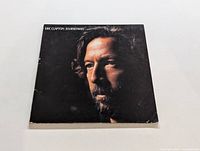 Front cover of Eric Clapton Journeyman LP showing artist portrait.