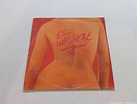 Front cover showing stylized nude image with text 'E.C. WAS HERE'