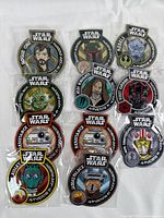 Image showing all 11 boxed Star Wars embroidered patches featuring various iconic characters and symbols.