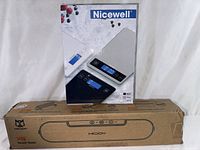 Box of Nicewell digital food scale showing silver model and digital display images on front