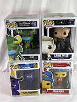 Four Funko Pop figures new and sealed in original boxes including Loki, Caine Wise, Tyler Tuskmon, and Marjora.