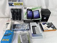 Full group photo showing all 9 pieces, their packaging, and arrangement on a white surface.