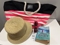 All items in lot: Victoria's Secret tote, Nine West hat, sunglasses, paperback