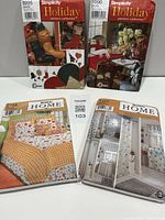 Group shot of four Simplicity sewing pattern envelopes