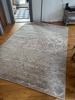Rug laid flat showing full pattern and condition