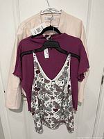 All three garments on hangers