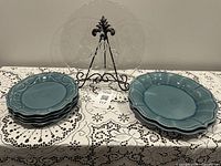 All items: stack of 4 teal 8in plates, stack of 2 teal 10.5in pasta dishes, clear glass cornflower cake plate on stand
