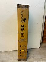 Photo of original cardboard packaging for Summer 3Dmini stroller showing brand and model name.