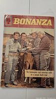 Full front cover of Four Color #1283 Bonanza comic showing the main characters and setting typical of the Bonanza TV show, with 15 cent Dell cover branding.
