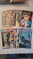 Full lot of 14 Detective Comics Batman issues, bagged and boarded.