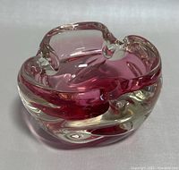 Front angle view of the heavy art glass bowl / ashtray showing shape, color, thickness and clarity of glass