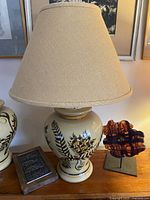 Photo of the first ceramic lamp with burlap shade on, showing the overall look and condition.