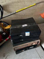 Stacked Xbox 360 consoles showing fronts and exterior condition