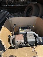 Engine and pump assembly of gas pressure washer inside original carton