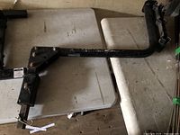 Overall view of L-shaped hitch rack on table