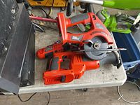 Top view showing circular saw and reciprocating saw stacked