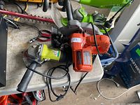 Top view of both tools showing bodies, cords and handles