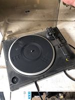 Top view of Kenwood KD-29R turntable showing platter, tonearm, dust cover, and power cord