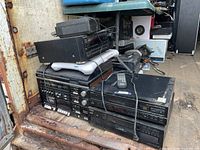 Front view of stacked Kenwood audio components, Nintendo Wii, remote and cables