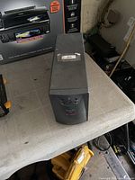 Front angle of APC Back-UPS surge adaptor on table