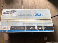 Samsung branded box showing model HT-D5330 and Blu-ray 3D features