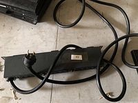 Full view of Tripp-Lite PDU with cord