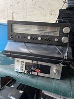 Technics SA-340 receiver stacked above Dual turntable and TR600 tuner