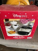 Retail box showing Disney Store Exclusive Winnie the Pooh waffle maker