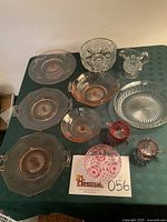 Group shot of all twelve glass items on table