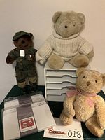 Group shot of desk sorter, three bears, packaged magnetic boards