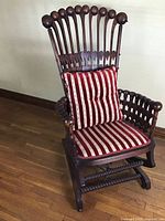 Front perspective view of the lollipop platform rocker showing full chair and seat cushion with matching pillow