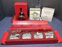 Overview showing train set, red and clear ball ornaments with original boxes