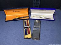 Overview of all three pens in their original boxes.