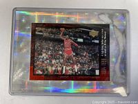 Front view of card in holder showing Jordan image and card details