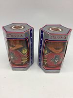 Both boxed wobble dolls front view